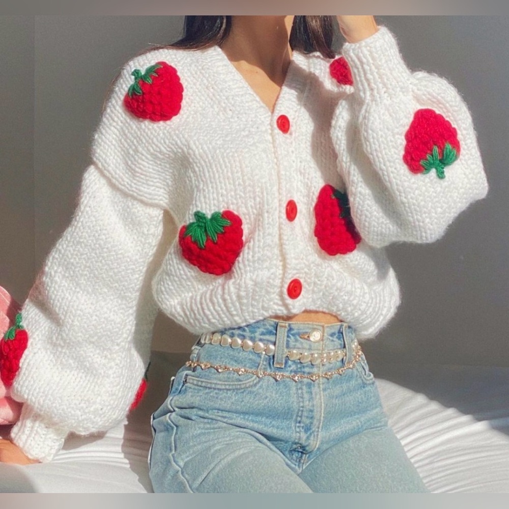 White Sweater with Red Apple Accents